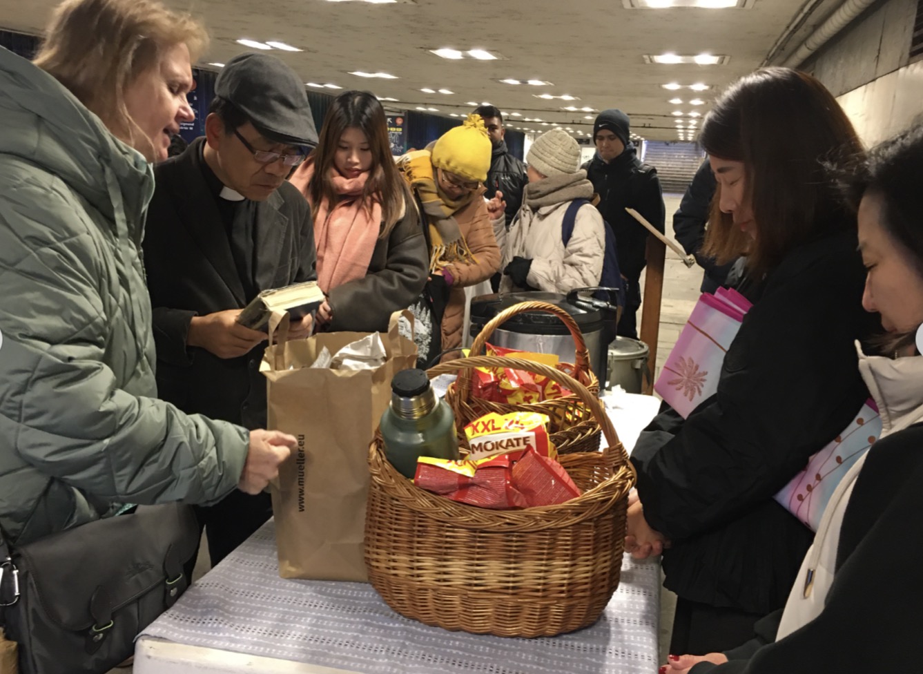 Volunteers serving food and supplies in Budapest